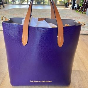 Brand new Dooney & Burke purple-tan tote.  Original tags & Certificate.